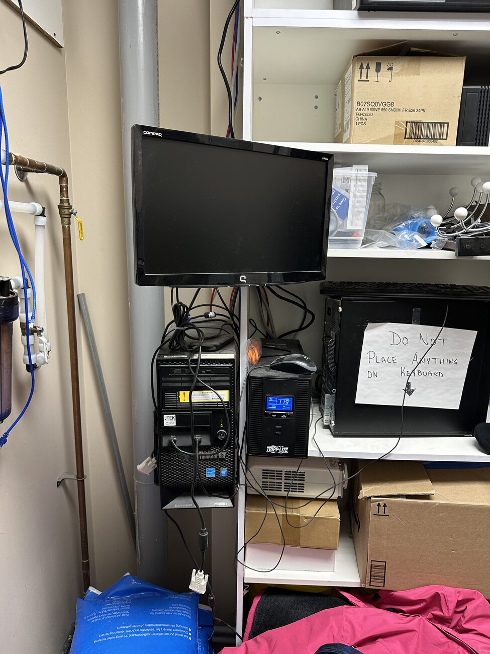 A cramped admin station before the upgrade.
