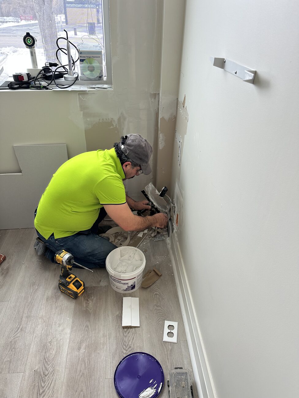 Running new wiring in the walls for the mounted screens.