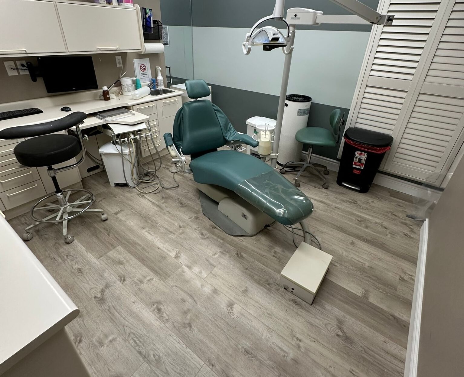 An operatory with fresh paint and new flooring.