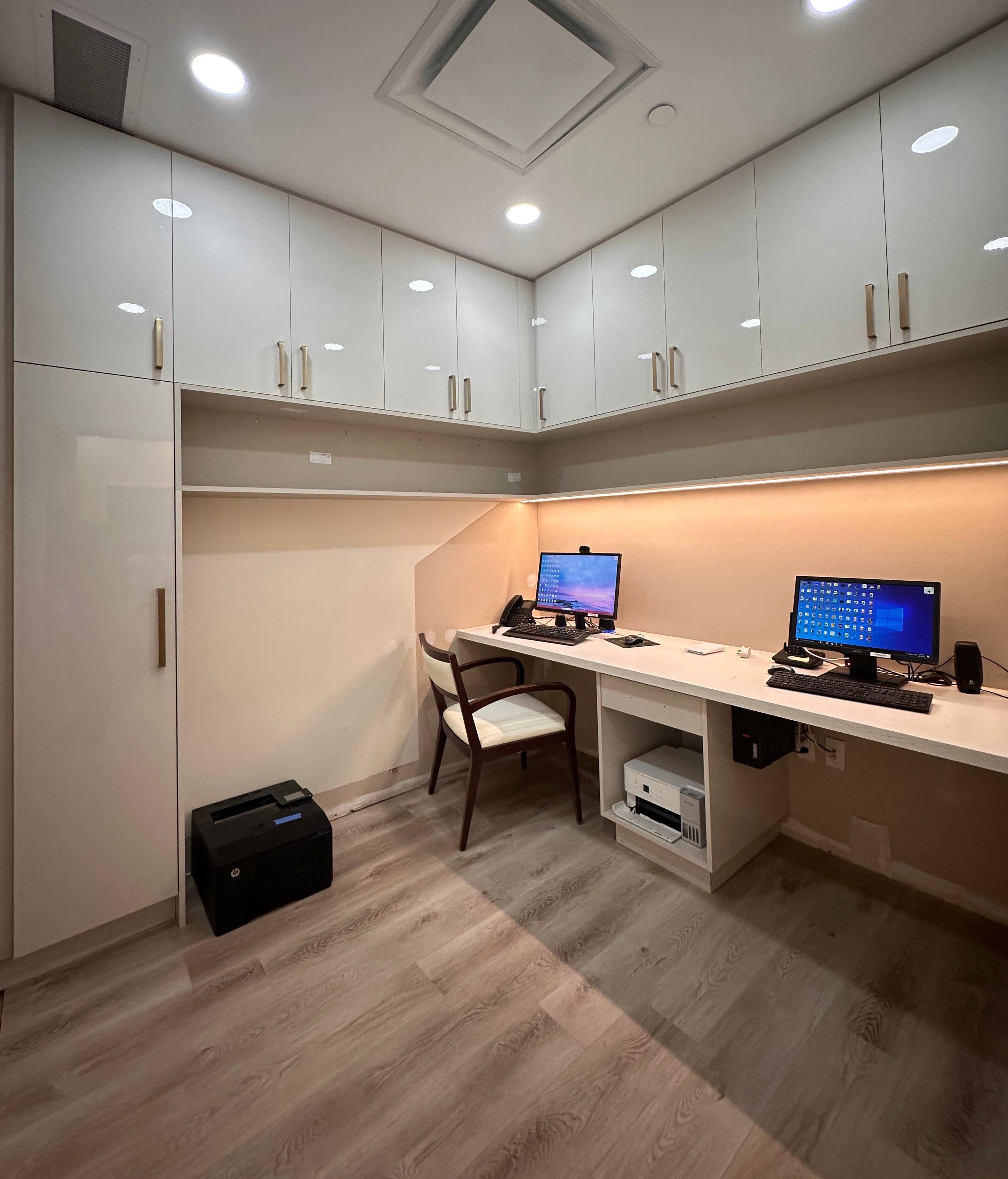 The refreshed admin station with custom modern office millwork