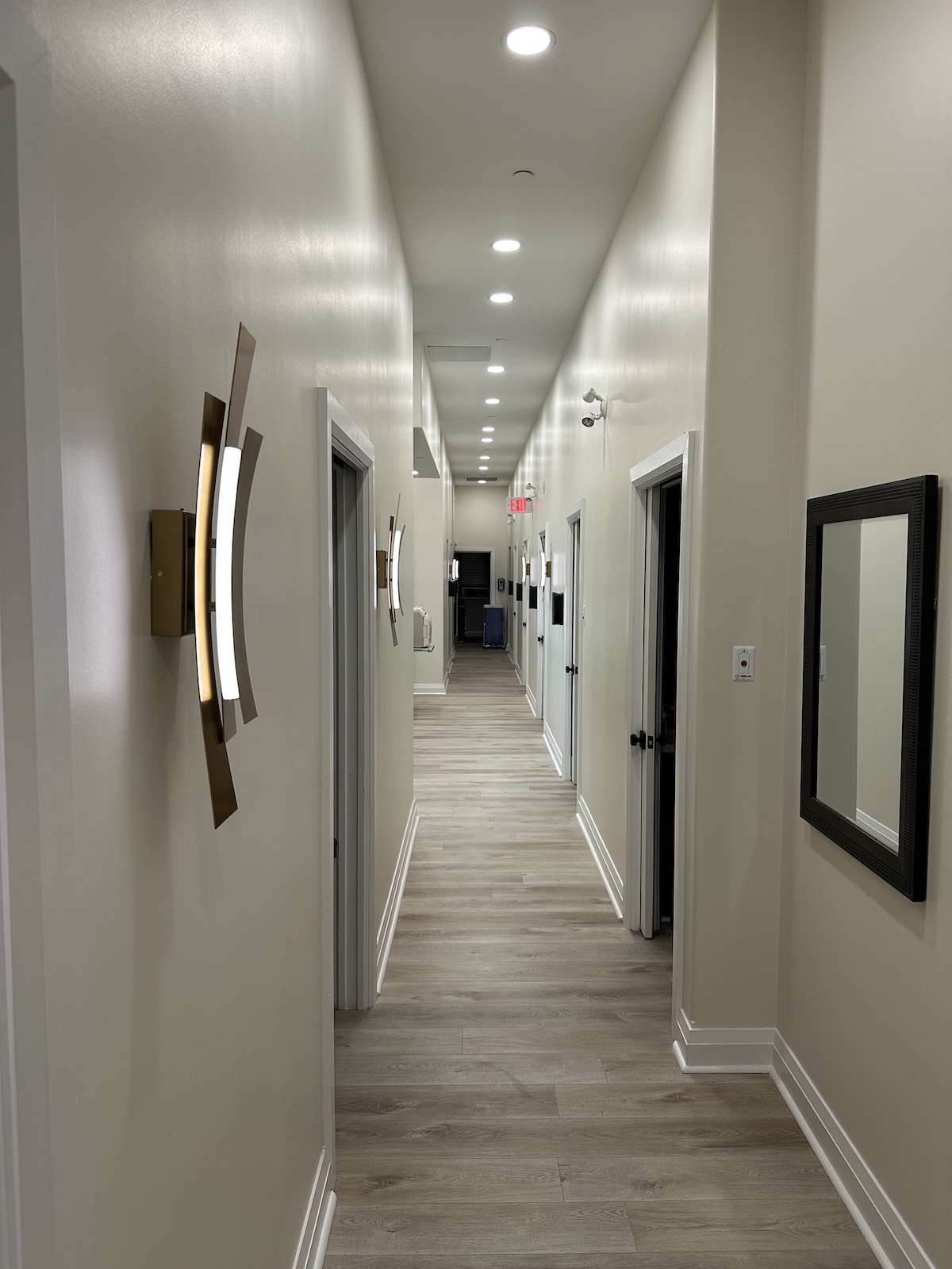 Modern looking hallway seamlessly integrated with new reception area