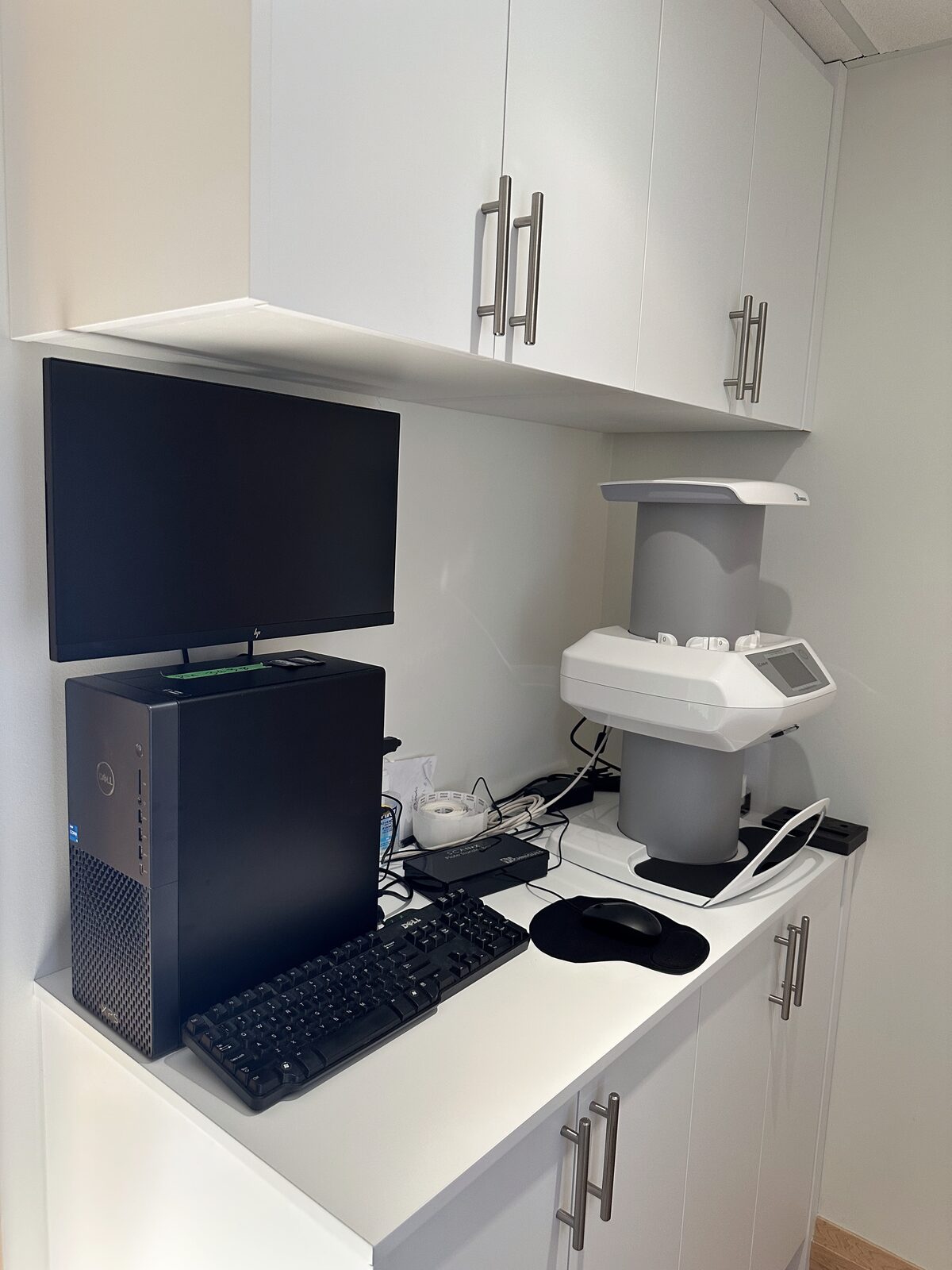 Finished imaging station with CBCT unit and computer station.
