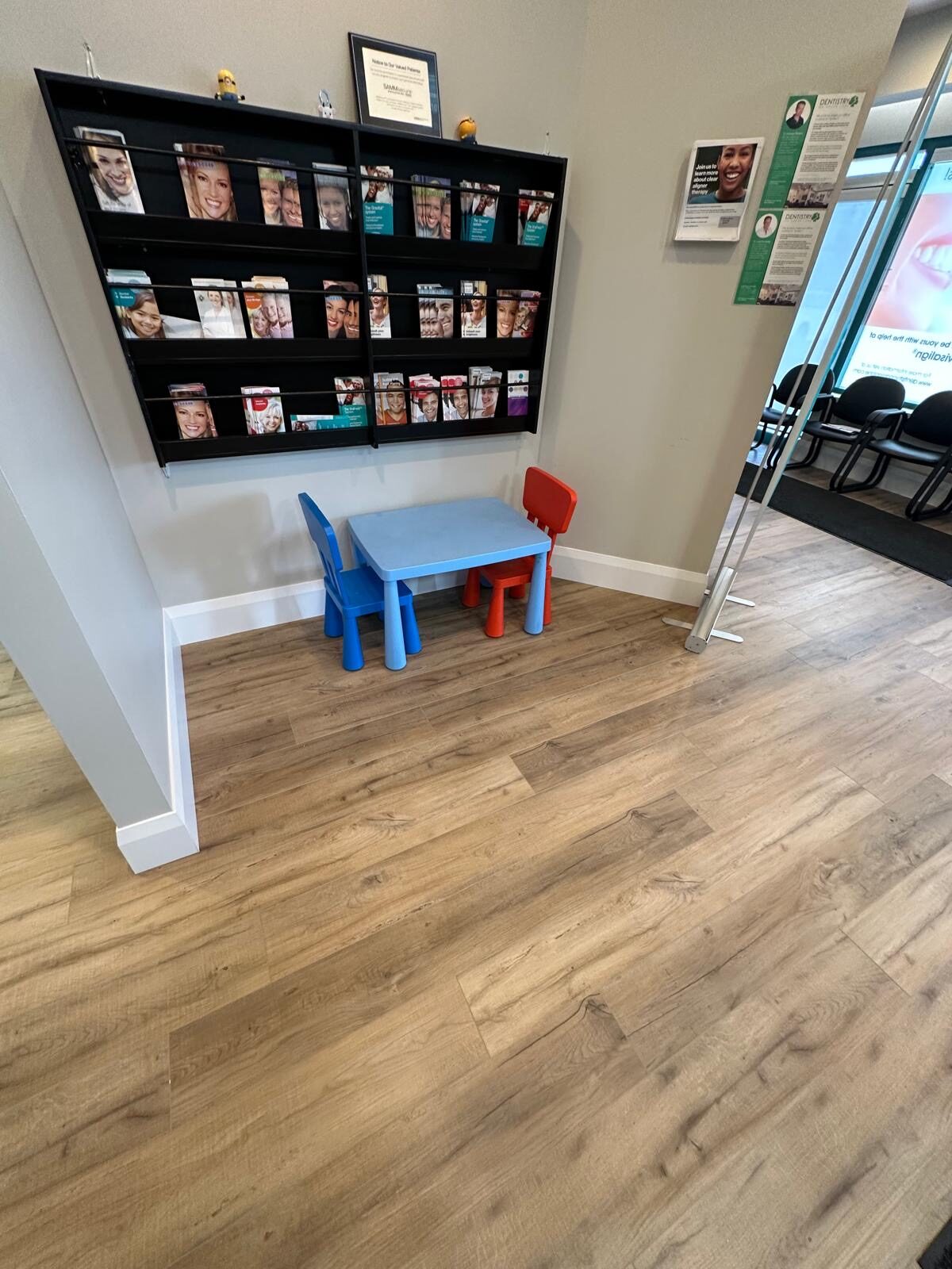 The children's waiting nook on the new wood-look floor.