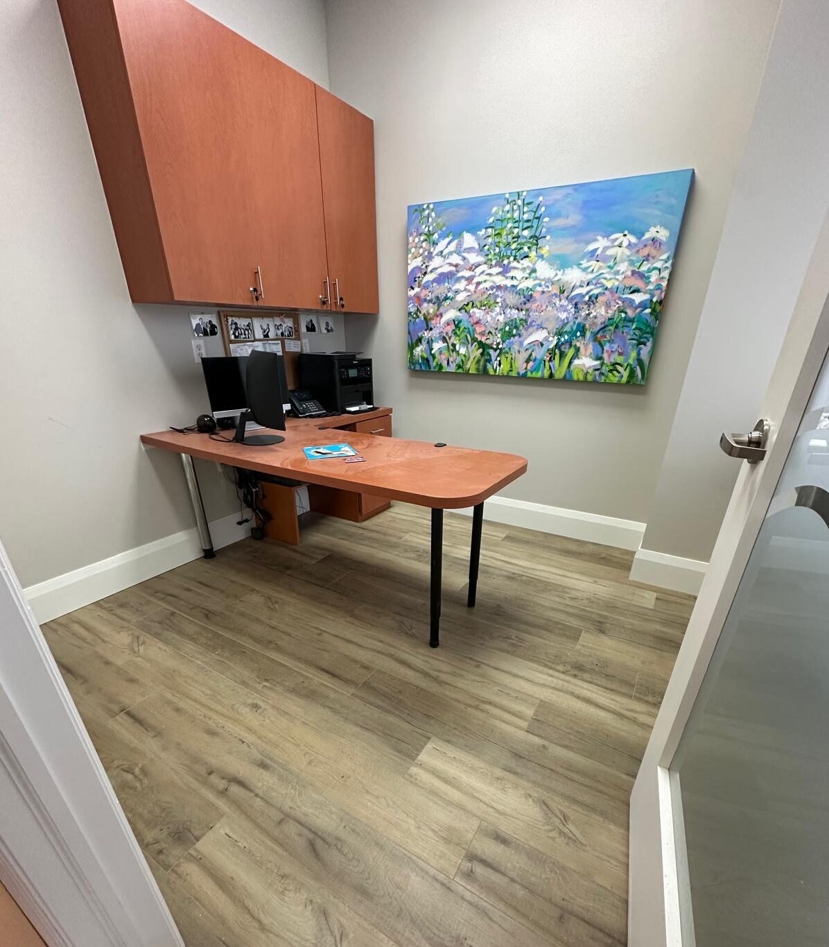 A private office with the new flooring carried through.