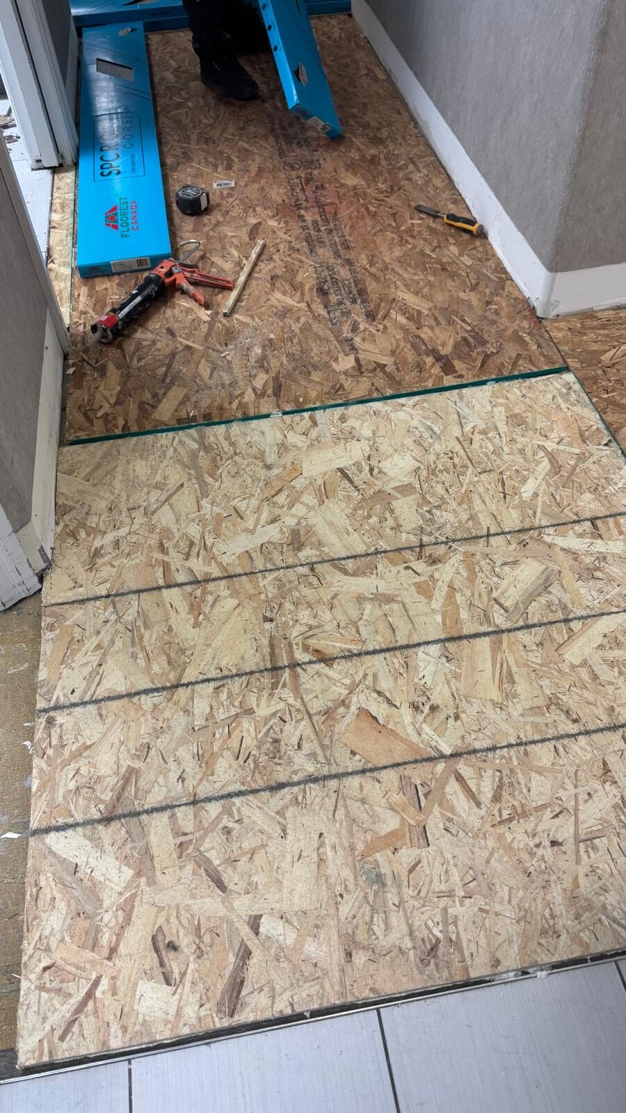 The prepared and leveled subfloor before the new floor goes down.